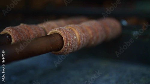 Traditional Czech trdelnik pastry cooking in Prague.