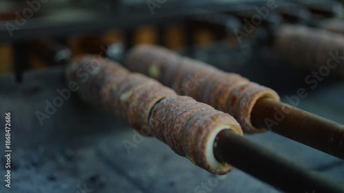 Traditional Czech trdelnik pastry cooking in Prague.