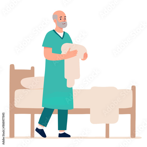 Elderly man dressed in scrubs carrying bed linens in a hospital room . Elderly set
