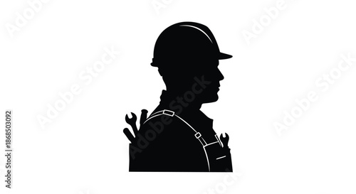 Construction worker profile featuring a hard hat and tools a striking silhouette