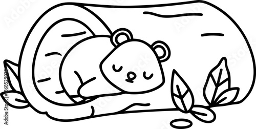 Sleeping bear cub inside hollow log with leaves around nature wildlife