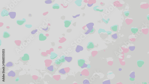 Colorful confetti scattered on a gray background.