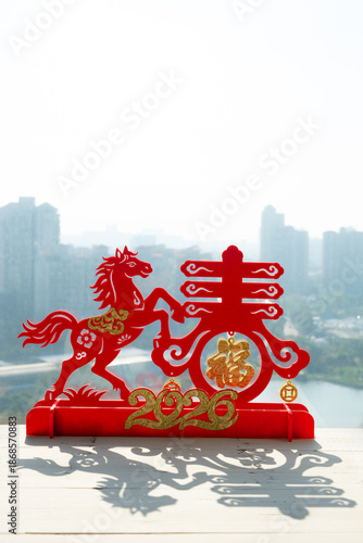 Chinese New Year of Horse 2026 mascot with shadow at vertical composition translation of the Chinese words are fortune and springtime no logo no trademark