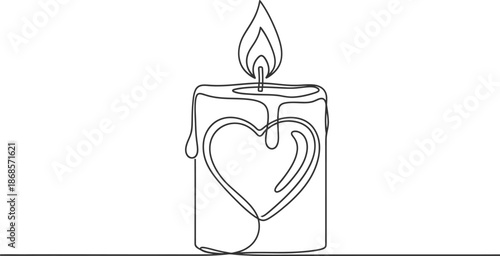 Candle with heart shape design on melted wax representing love and care