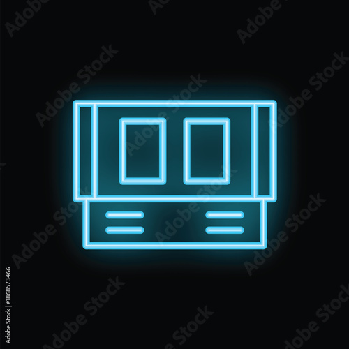 Glowing blue neon sign in the shape of a classic video game cartridge is isolated on a black background