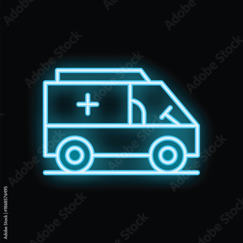 Bright neon ambulance sign is glowing on a dark background