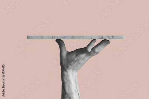Marble Hand Holding a Thin Marble Slab Against a Soft Pink Background
