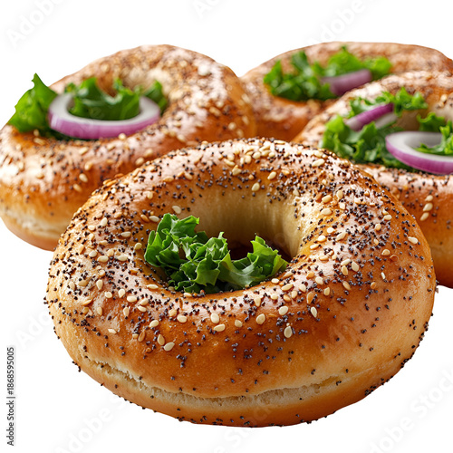Three freshly topped bagels displayed close up