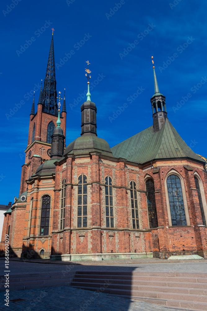 Obraz premium Exterior of Riddarholmen Church, the church of the former medieval Greyfriars Monastery in Stockholm, Sweden. The church serves as the final resting place of most Swedish monarchs