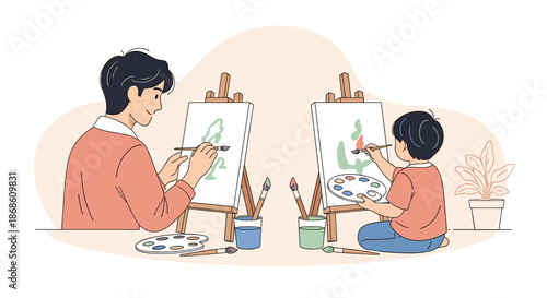 Creative father and his young son sitting across from each other, happily painting on canvases with easels in a shared artistic moment.