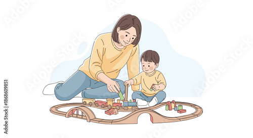 Happy mother and her young son playing together on the floor with a wooden toy train set, building tracks and having fun.
