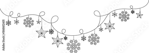Beautiful black and white christmas decoration with snowflakes and stars hanging on a string