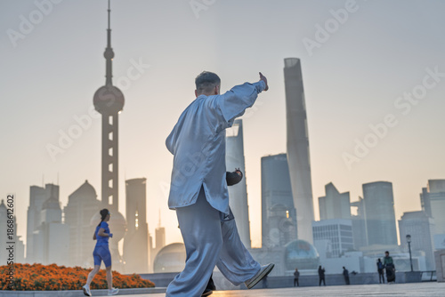 Shanghai's Bund and Lujiazui in the morning light, along with citizens exercising in the morning.