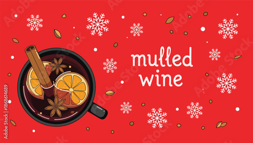 Top view of a mug filled with hot mulled wine orange slices and cinnamon sticks on a festive red snowflake background.