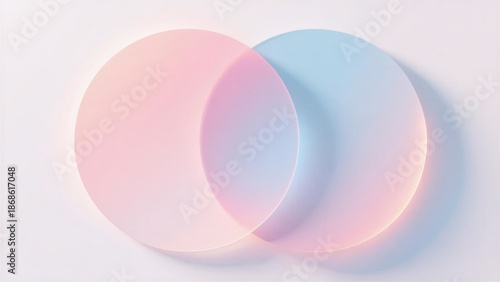 Two overlapping translucent circles with soft pink and blue gradients, creating a harmonious blend of light and shadow, expressed as modern abstract art or Used for digital backgrounds.
