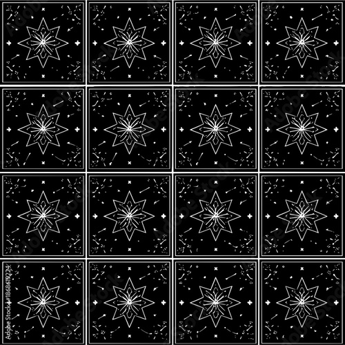 Monochrome tiled pattern of eight pointed stars with decorative elements in square frames on black background
