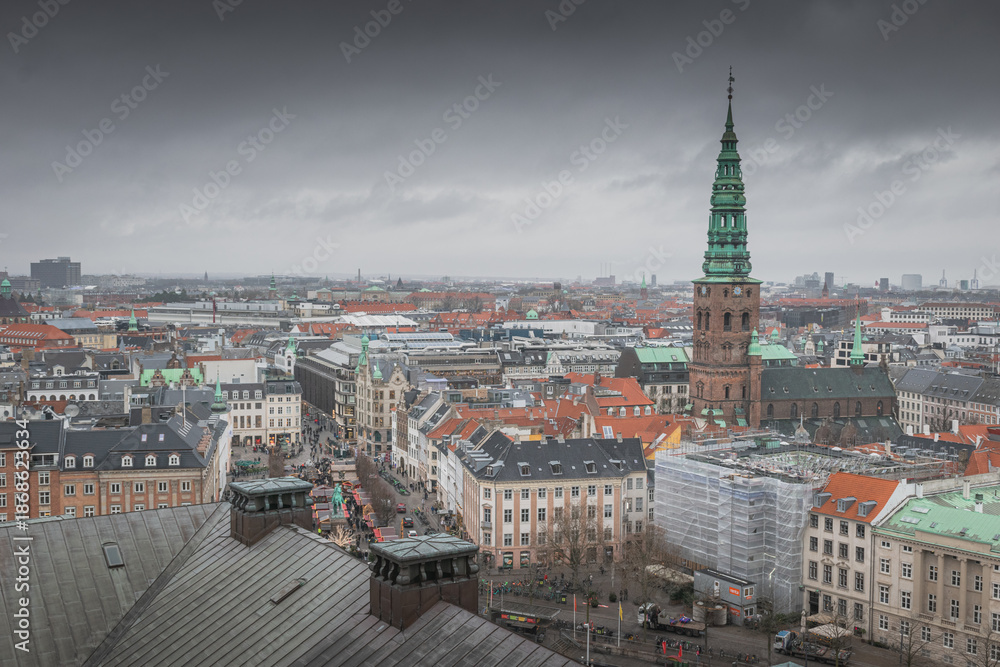 Obraz premium Church of Our Saviour spire above Copenhagen rooftops