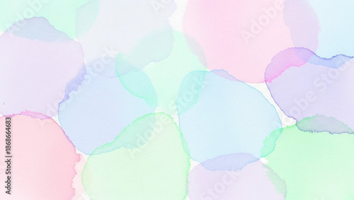 Soft pastel watercolor circles in shades of pink, blue, and green