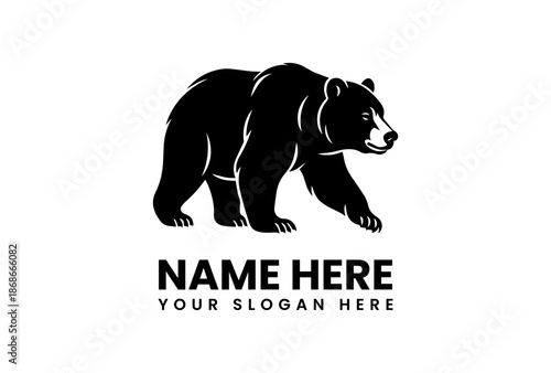 Powerful Black Bear Silhouette Striding Forward with Determined Gaze.