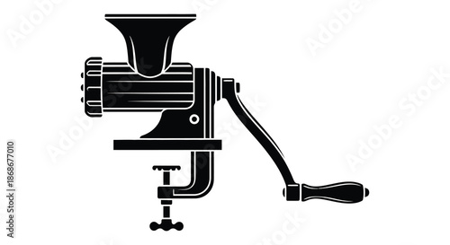 A striking black silhouette of a vintage manual meat grinder showcasing its classic design silhouette