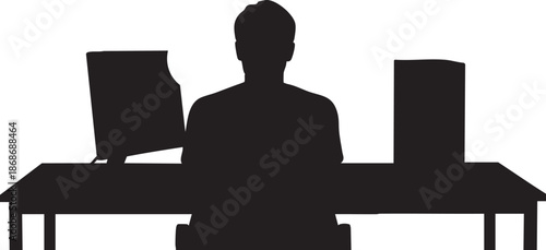Black silhouette of a person sitting at a desk with two computer monitors