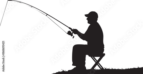 Silhouette of a person fishing with a rod sitting on a chair near the water