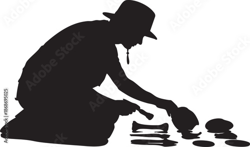 Silhouette of a person with a hat and a gun pointing at a small on the ground