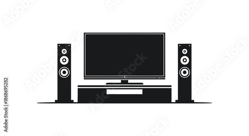 a modern home entertainment system featuring a flat screen tv and speakers a striking silhouette
