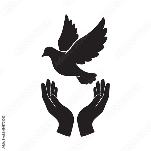 Silhouette of hands releasing a dove symbolizing peace and freedom