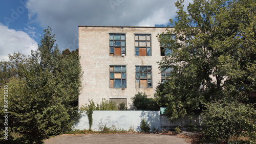 Wallpaper Mural Abandoned industrial building with broken windows Torontodigital.ca