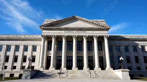 Federal Reserve building with grand columns under blue sky