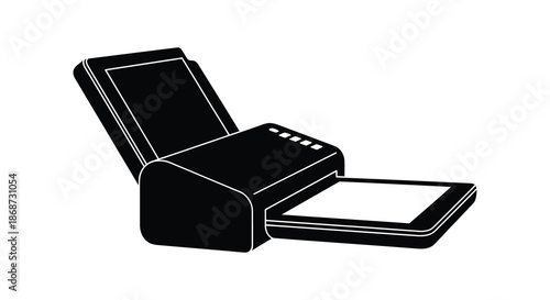 a modern laptop computer shown in a stark black and white image a striking silhouette