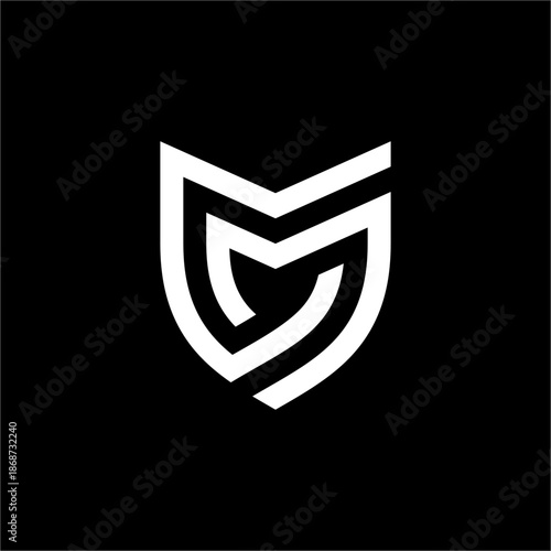 The letter M is enclosed within the outline of a pointed shield. It symbolizes strong defense, rapid progress, and exclusive risk management.