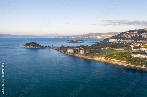 Wallpaper Mural Aerial view of the serene coastline where the deep blue sea meets the rugged land near Pigeon Island, Kusadasi, Aydin, Turkey. Torontodigital.ca