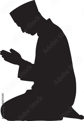 Silhouette of a muslim man in prayer