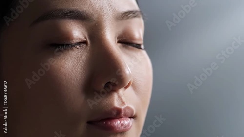 Close-up of woman crying with tears on her face