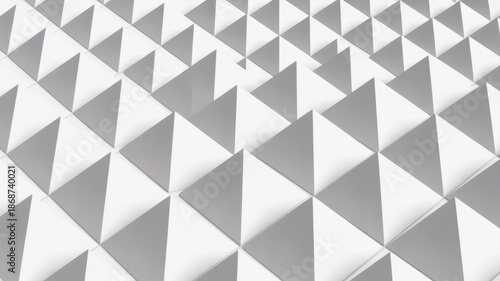 A modern geometric pattern of gray and white triangles