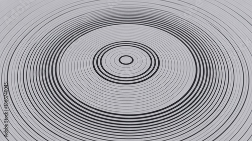 A black and white image of concentric circles on a gray background