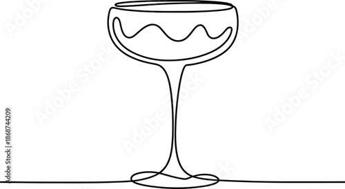 A continuous line drawing of an elegant coupe glass for cocktails or champagne