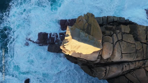 Above View Of Foamy Waves In Vertical Sea Cliffs Of Cantís de Papel Near Xove In Lugo, Galicia, Spain. Aerial Topdown Shot