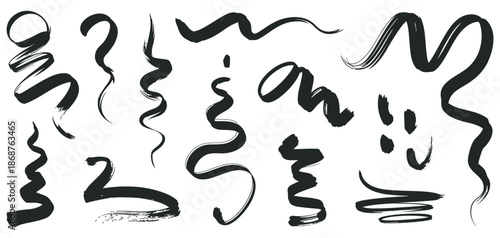 Expressive collection of hand-drawn black brushstrokes, wavy lines, and grunge paint splatters, perfect for adding artistic flair and dynamic texture to creative designs