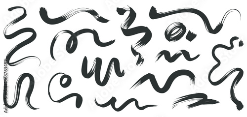 Collection of abstract brush stroke elements and artistic hand-drawn lines for creative design