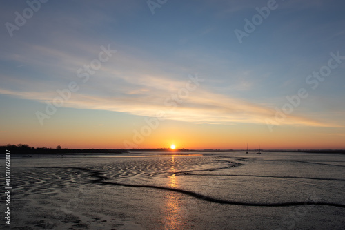 Sunrise over the Blackwater estuary at Maldon in Essex, UK