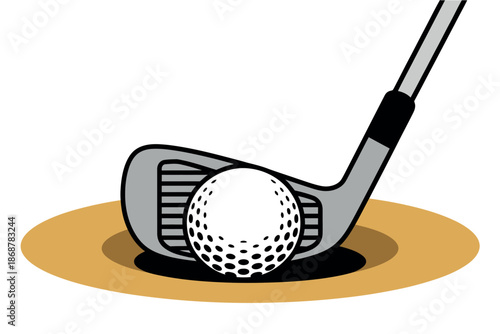 A golf ball resting on a golf club in a sand trap on a golf course