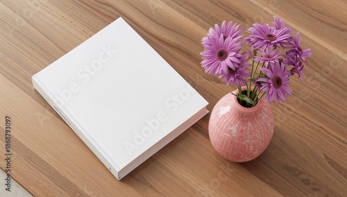 Flowers and Blank Notebook on Wooden Table With Natural Lighting in a Cozy Se...