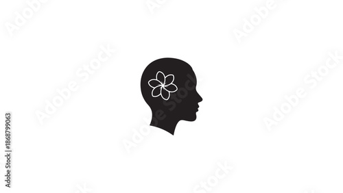 Silhouette of a head with a flower inside representing creativity and intelligence