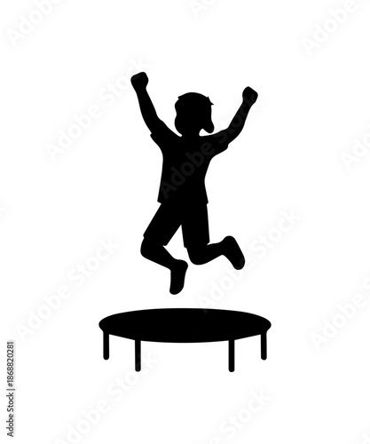 Child jumping on trampoline silhouette enjoying freedom and play