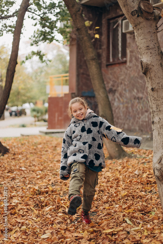 little girl playing in the park