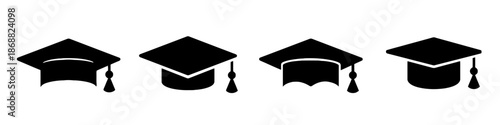 Set of four black graduation caps for celebrating achievement