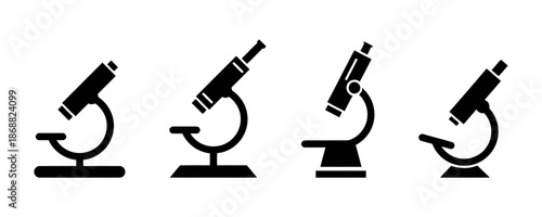 Set of four black silhouette microscope icons science